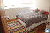 PF-TS: Dormitorio con ventanas hacia la calle