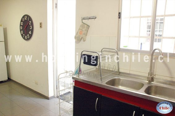 RE-RY: Cocina y acceso a patio de lavanderia